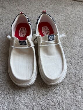 Hey Dude Womens White Canvas Slip-On Sneakers with Red Insoles